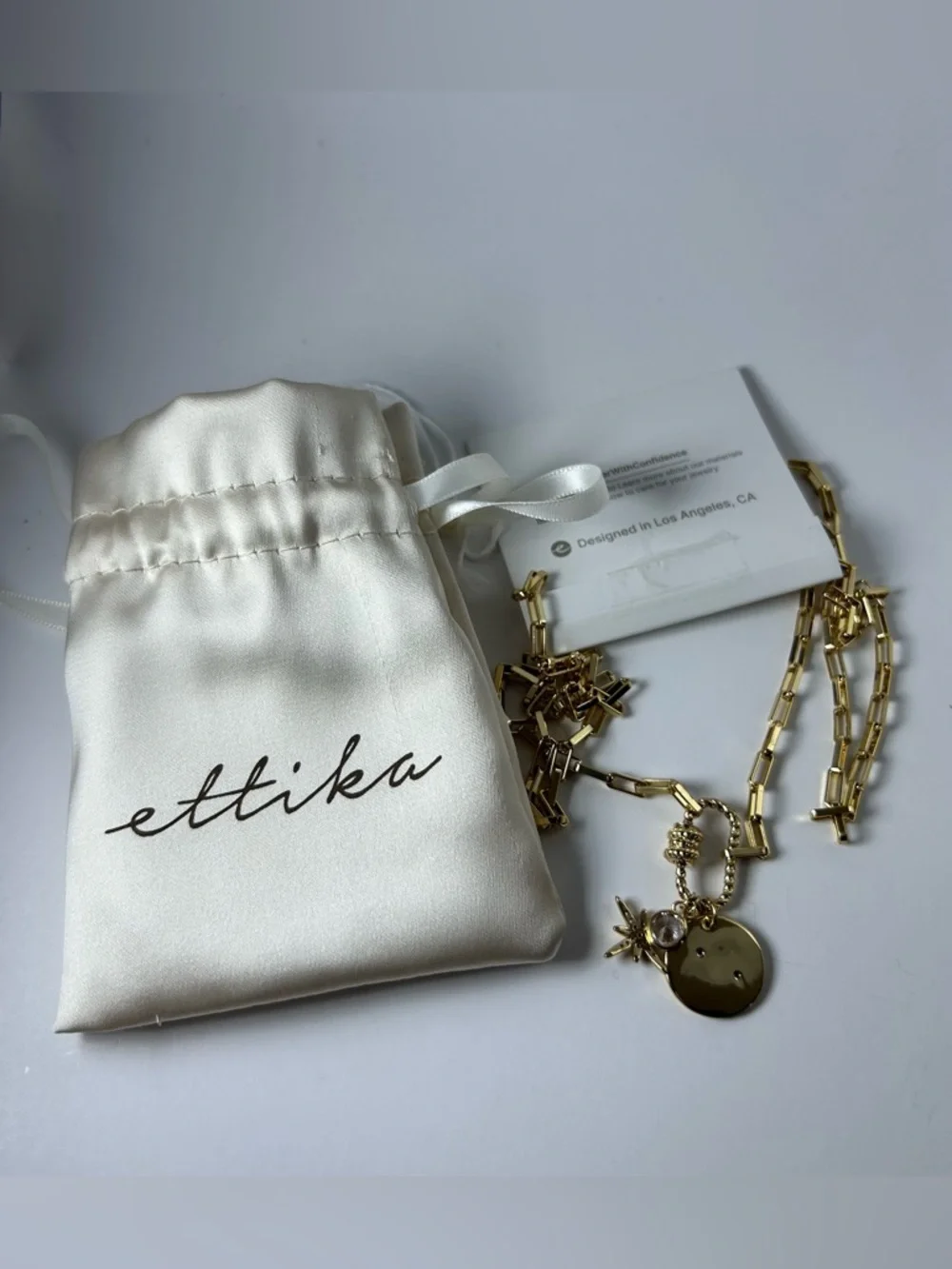 ettika Gold Starburst Crystal & Disc Charm Pendant Necklace - Picture 8 of 9